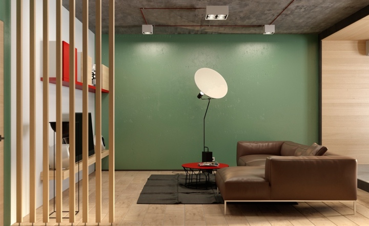 green-wall-leather-couch